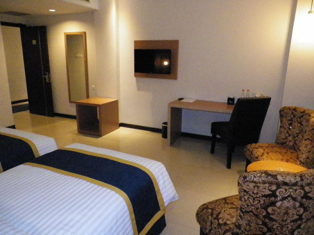 D'Best Hotel Pasar Baru Бандунг Номер фото