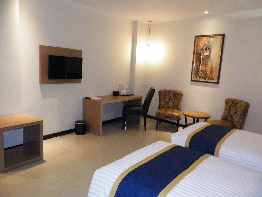D'Best Hotel Pasar Baru Бандунг Номер фото