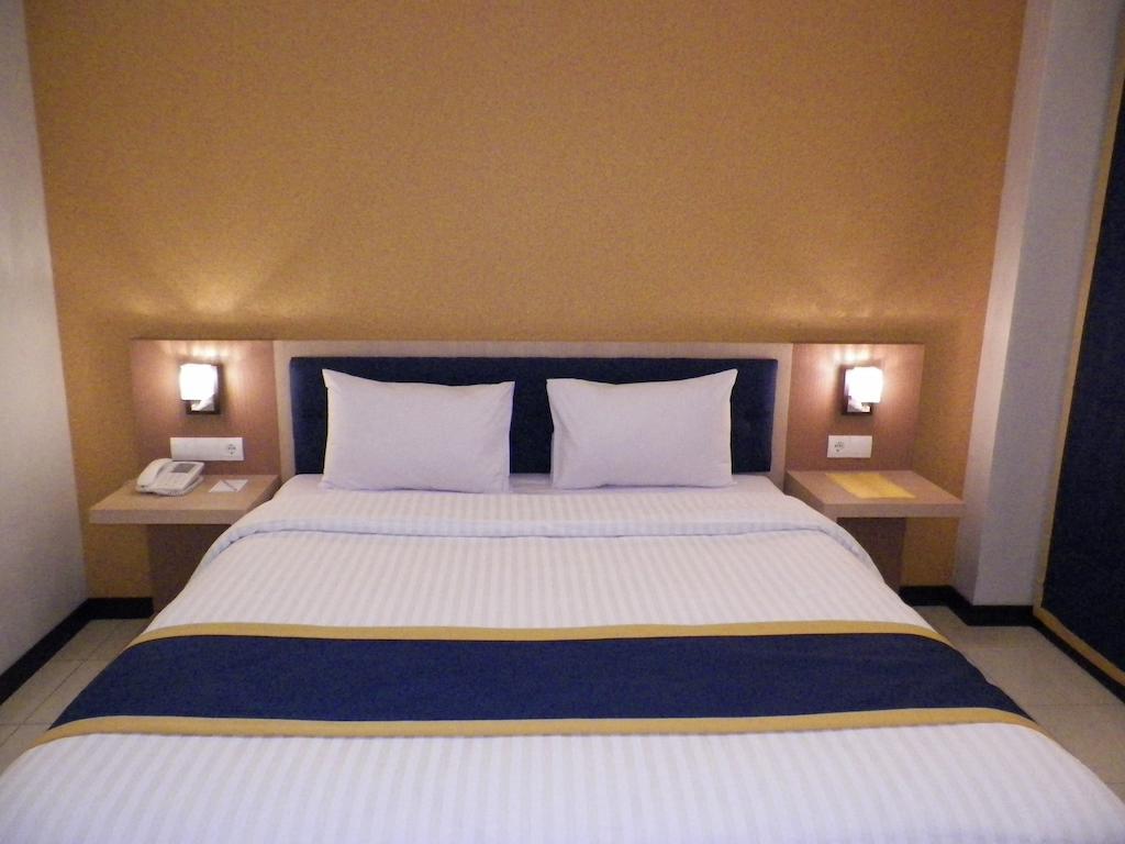 D'Best Hotel Pasar Baru Бандунг Номер фото