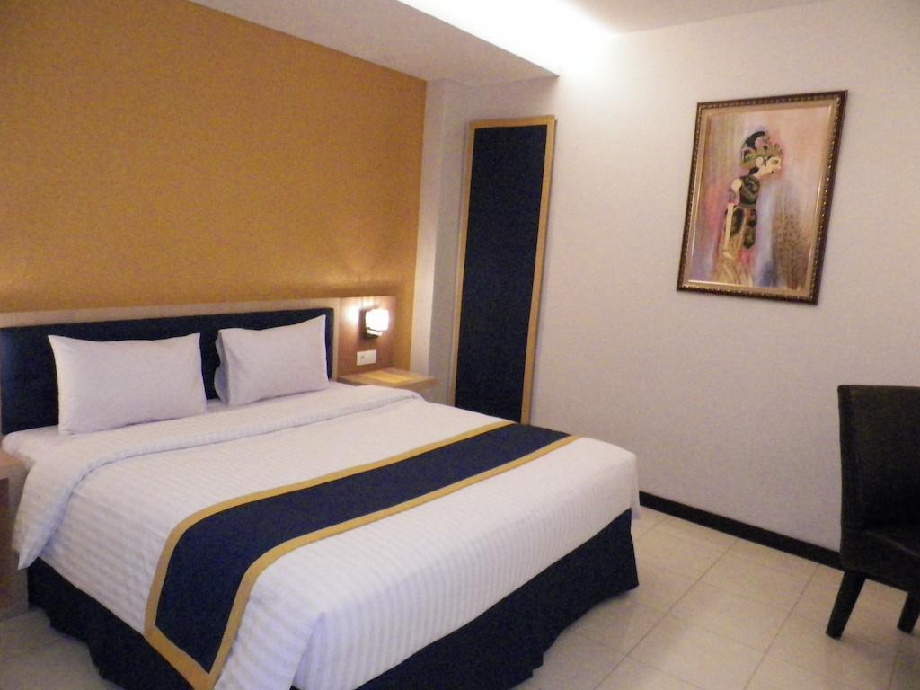 D'Best Hotel Pasar Baru Бандунг Номер фото