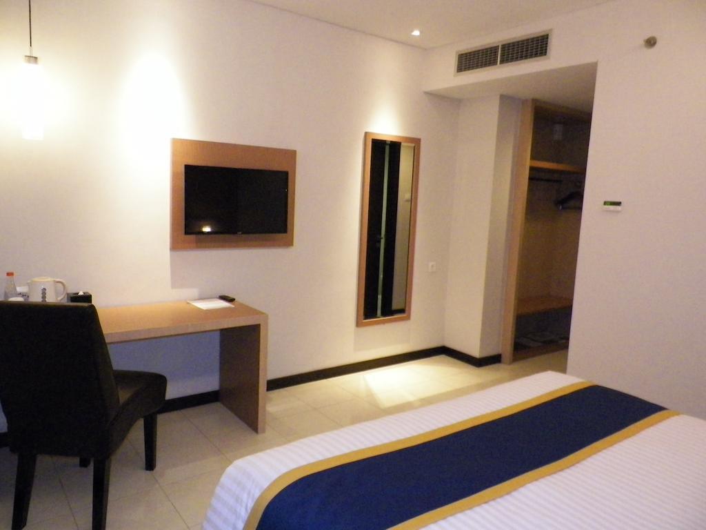 D'Best Hotel Pasar Baru Бандунг Номер фото