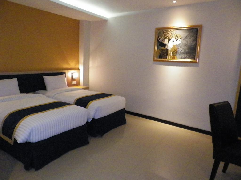 D'Best Hotel Pasar Baru Бандунг Номер фото