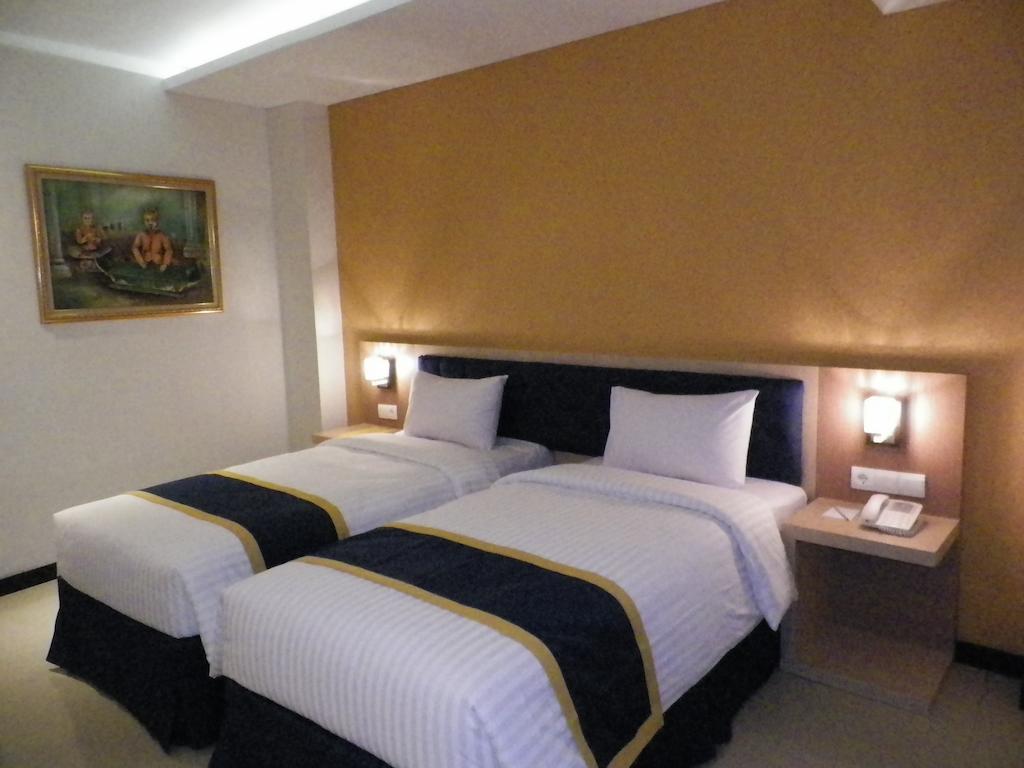 D'Best Hotel Pasar Baru Бандунг Номер фото
